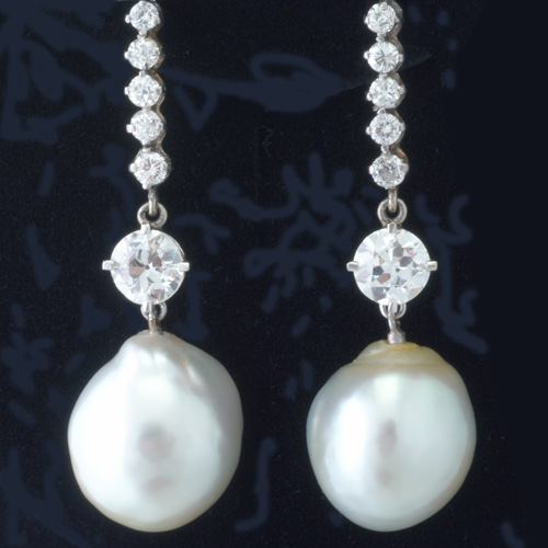 Appraisal: Diamond and baroque pearl earring pendants in k wg to