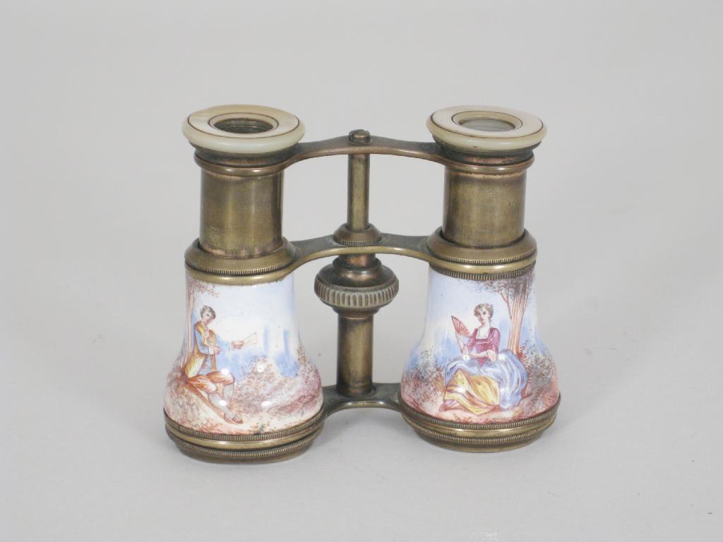 Appraisal: Pair of enamel mounted Opera Glasses decorated figures in landscape