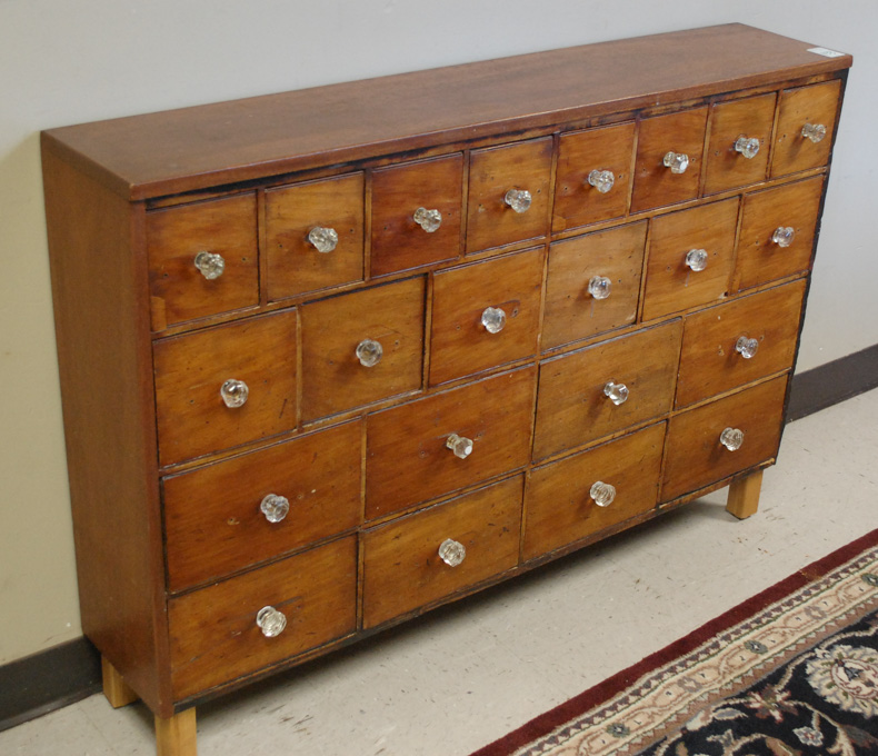 Appraisal: MAHOGANY APOTHECARY CHEST having various drawers with clear glass knobs