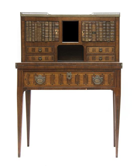 Appraisal: An Edwardian Inlaid Mahogany Writing Desk the galleried superstructure fitted