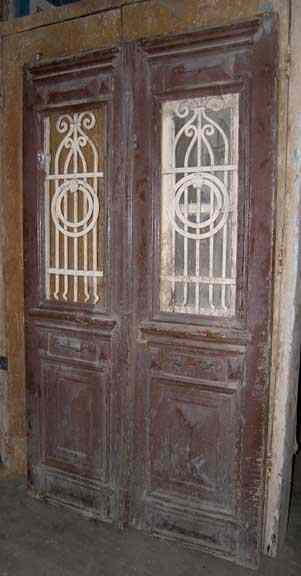 Appraisal: A French Colonial Painted Pine and Iron Double Door circa