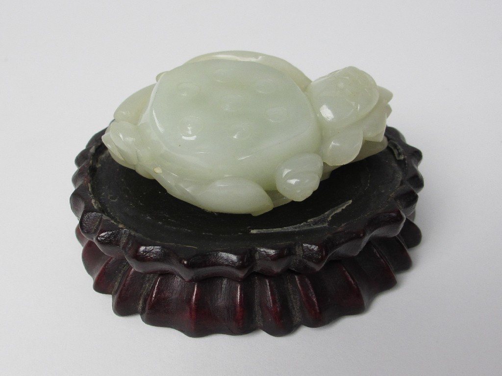 Appraisal: A Chinese jade carving of a lotus cm wide