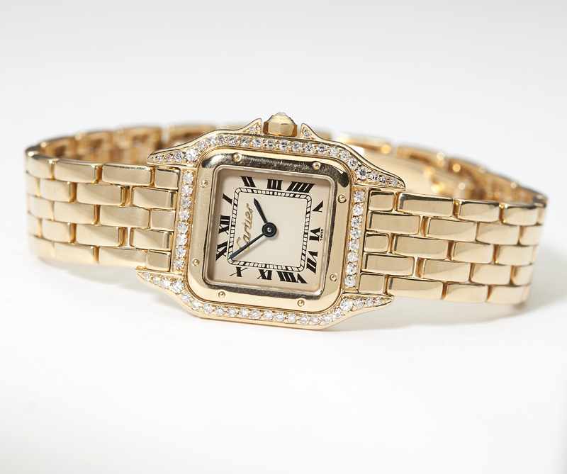 Appraisal: A gold wristwatch Cartier ''Panthere'' The square white dial with