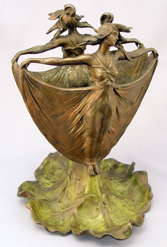 Appraisal: ART NOUVEAU FIGURAL CENTERPIECE Patinated iron base in the form