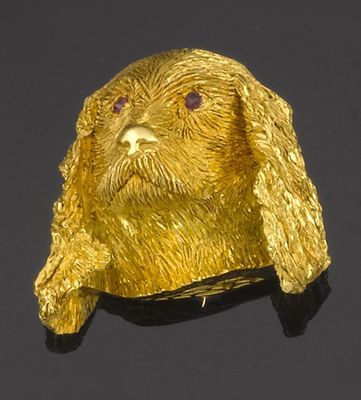 Appraisal: A gold dogs head brooch by Cartier Realistically formed as