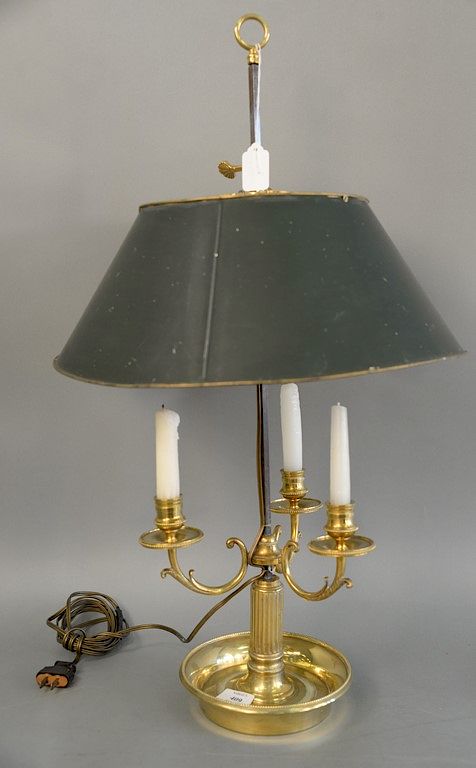 Appraisal: A Louis XVI style brass three light bouillotte lamp with