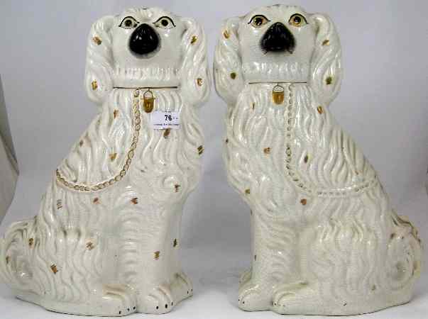 Appraisal: Pair th Century large Staffordshire Fireside Dogs height cm