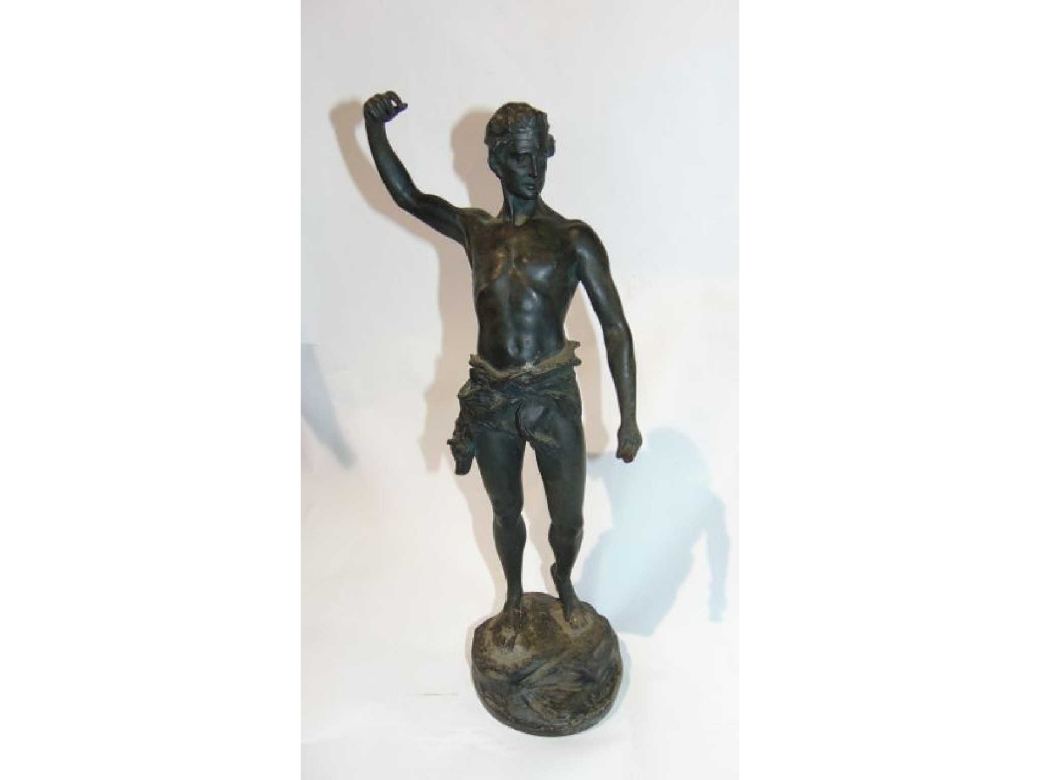 Appraisal: A cast bronze study of a well modelled standing male