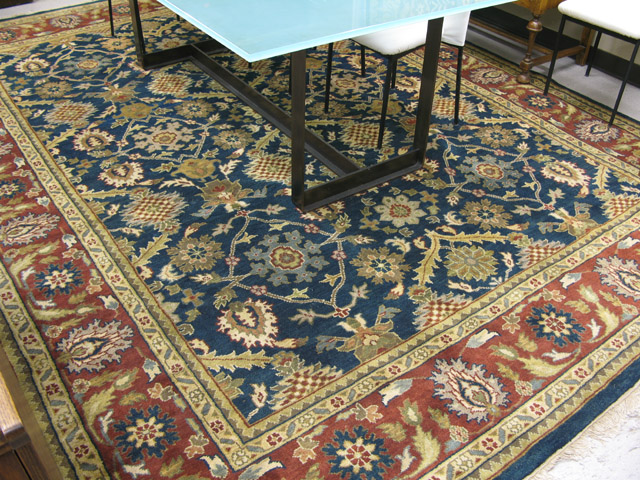 Appraisal: HAND KNOTTED ORIENTAL CARPET Indo-Persian having a floral decorated blue