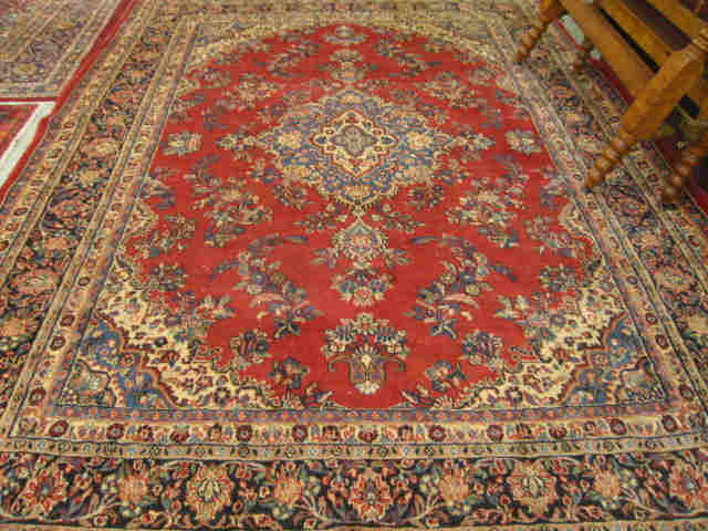 Appraisal: Mahal Persian Handmade Rug elegant floral decor reds blues ivory