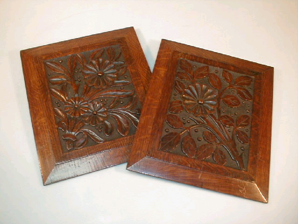 Appraisal: A pair of early thC oak panels each intaglio carved