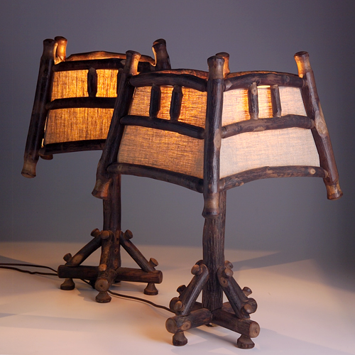 Appraisal: OLD HICKORY Pair of new rustic table lamps with four-sided