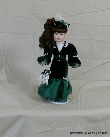 Appraisal: Brass Key Porcelain Designer Doll from - Camellia Garden Collection