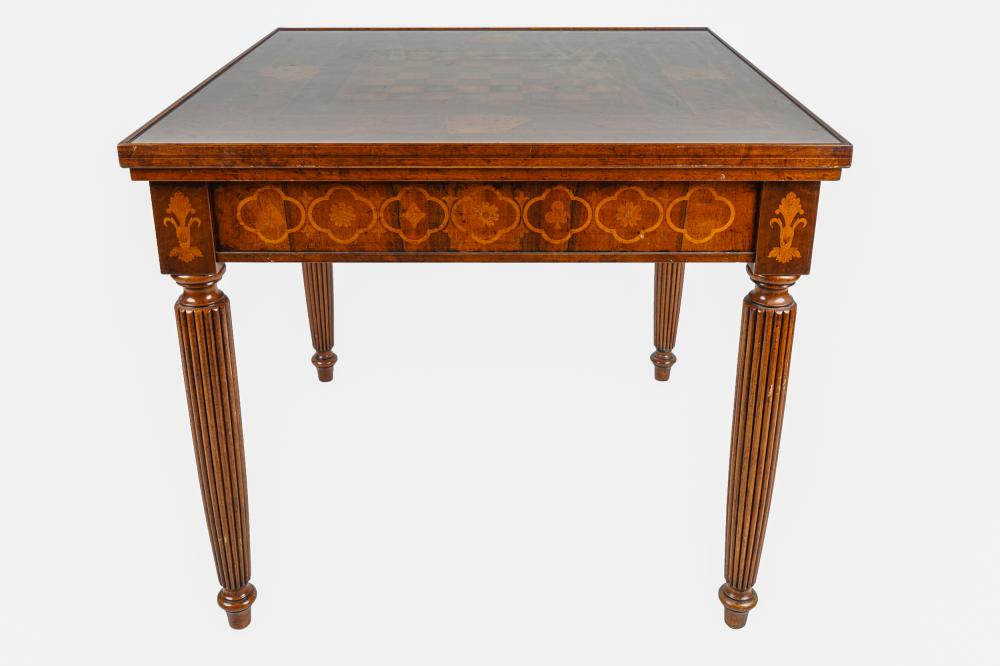 Appraisal: ITALIAN MARQUETRY-INLAID GAMES TABLE th century the removable inlaid with