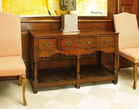 Appraisal: A George III oak dresser base of small proportion the