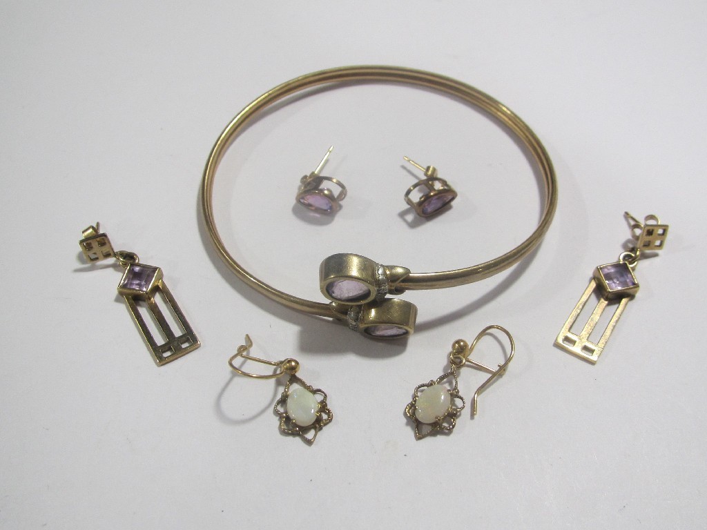 Appraisal: Lot comprising a ct gold cross over bangle set with