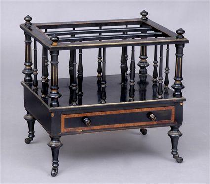 Appraisal: VICTORIAN AESTHETIC MOVEMENT EBONIZED AND PARGEL-GILT CANTERBURY The division top