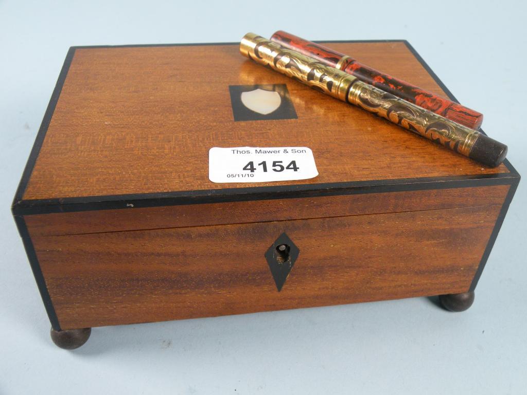 Appraisal: A thC mahogany rectangular box inlaid with a mother of