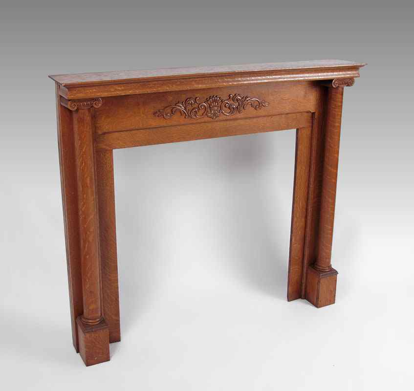 Appraisal: GOLDEN OAK FIREPLACE MANTLE Applied carved decoration carved full column