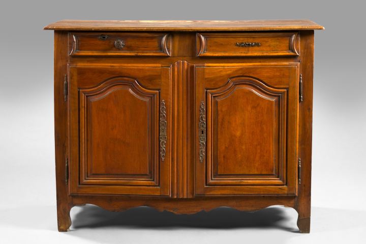 Appraisal: French Provincial Walnut Buffet th century the rectangular top with