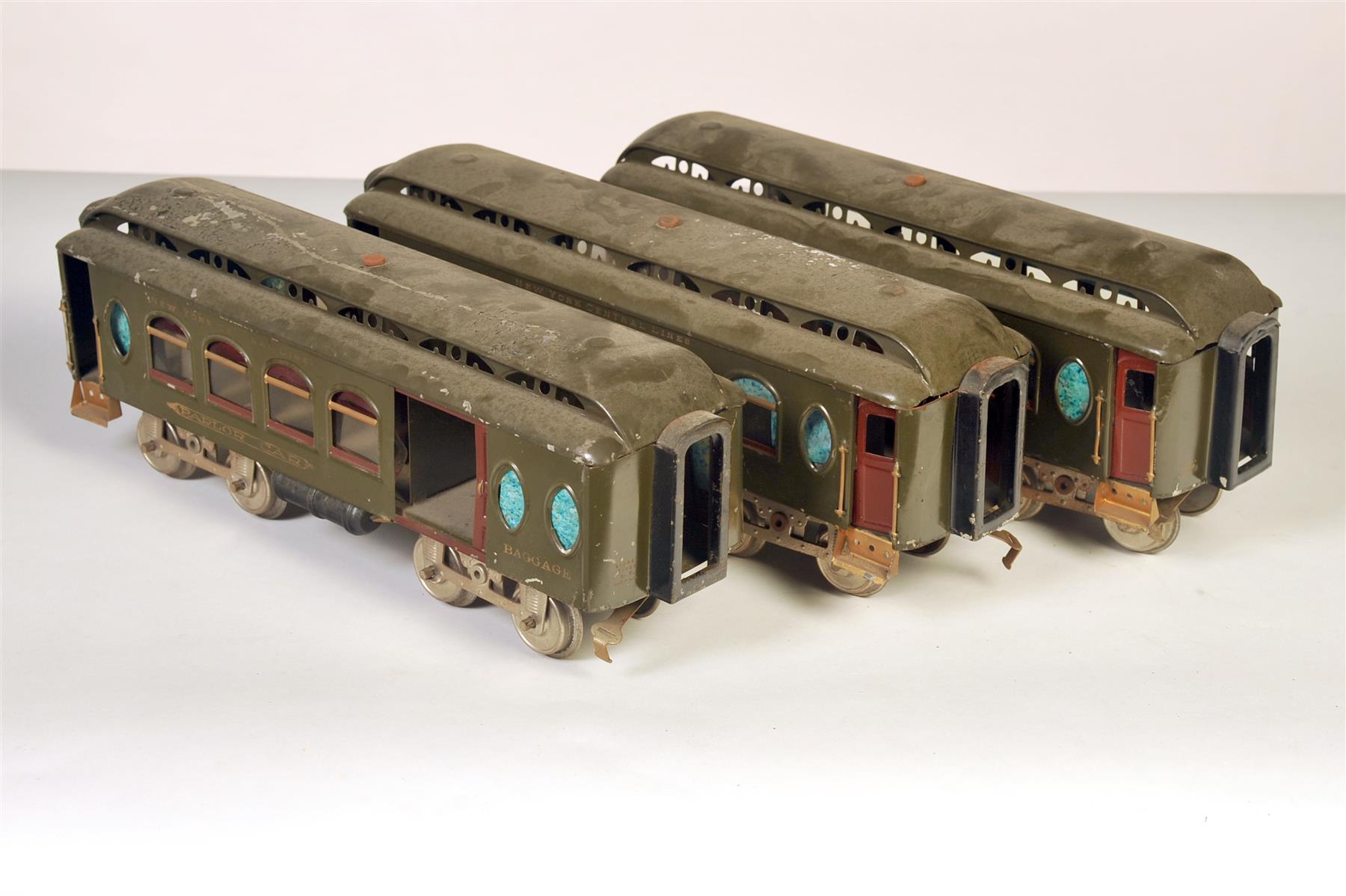 Appraisal: THREE EARLY LIONEL STANDARD GAUGE PASSENGER CARS INCLUDING COMBINE BAGGAGE