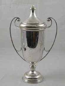 Appraisal: A tall hallmarked silver challenge cup and cover uninscribed cm