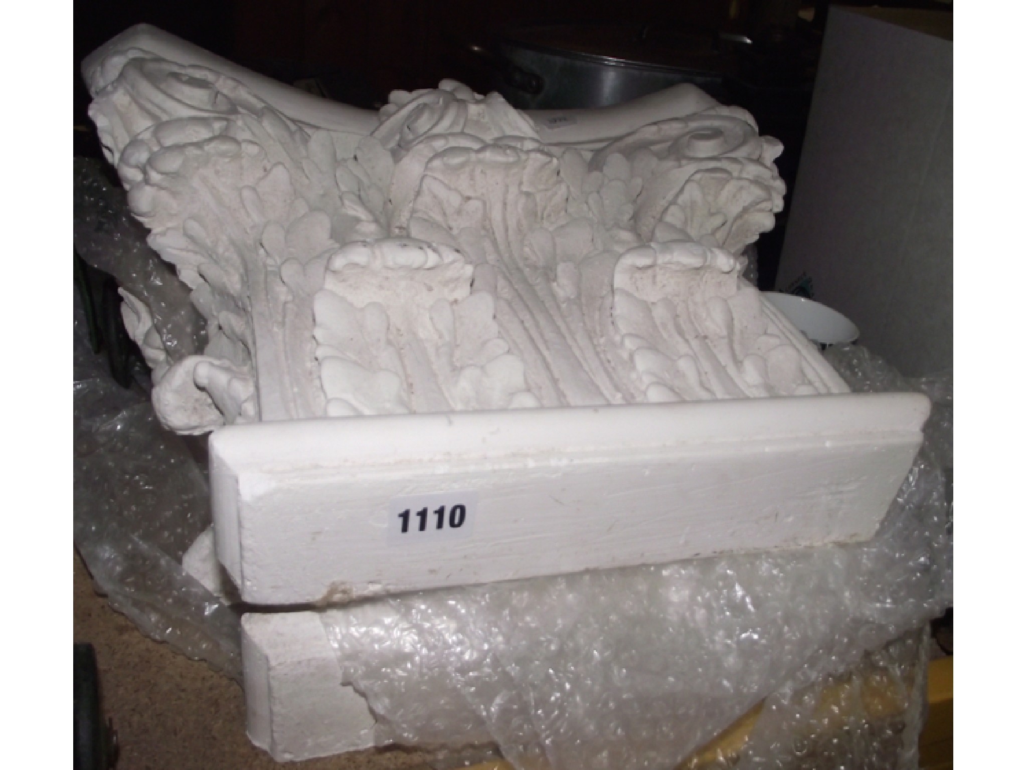 Appraisal: A pair of ornamental architectural plaster corbels in the form