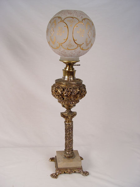 Appraisal: BRADLEY HUBBARD BANQUET LAMP Converted to electricity Tall brass ornamented