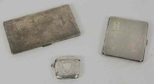 Appraisal: An engine turned silver cigarette case Birmingham an engraved vesta