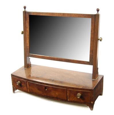 Appraisal: An early th century mahogany dressing table mirror with reeded