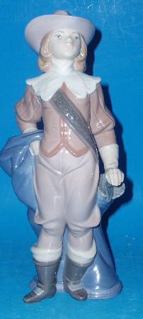 Appraisal: A Lladro Figure Of A Boy dressed as a Cavalier