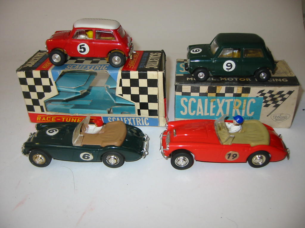 Appraisal: Four Scalextric slot racing cars C Austin Healey green Austin