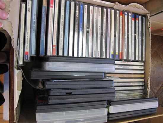 Appraisal: ONE SMALL BOX OF ASSORTED DVDS AND CDS