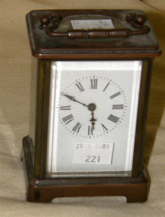 Appraisal: A CARRIAGE CLOCK with a white enamel dial and brass