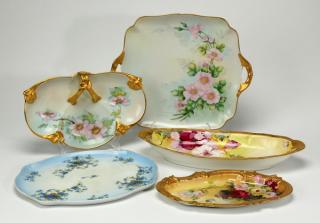 Appraisal: Hand painted porcelain trays Group of five associated Continental hand