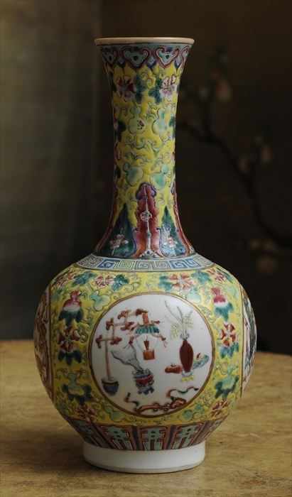 Appraisal: FAMILLE ROSE YELLOW-GROUND BOTTLE VASE in