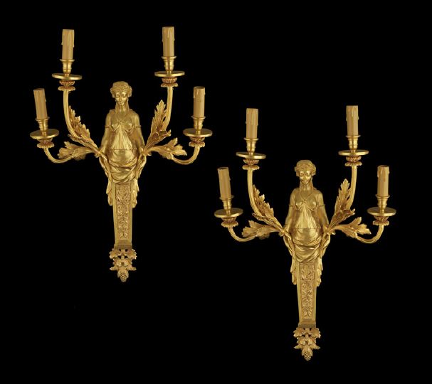 Appraisal: Pair of French Gilt-Bronze Atlantid Four-Light Appliques in the Louis