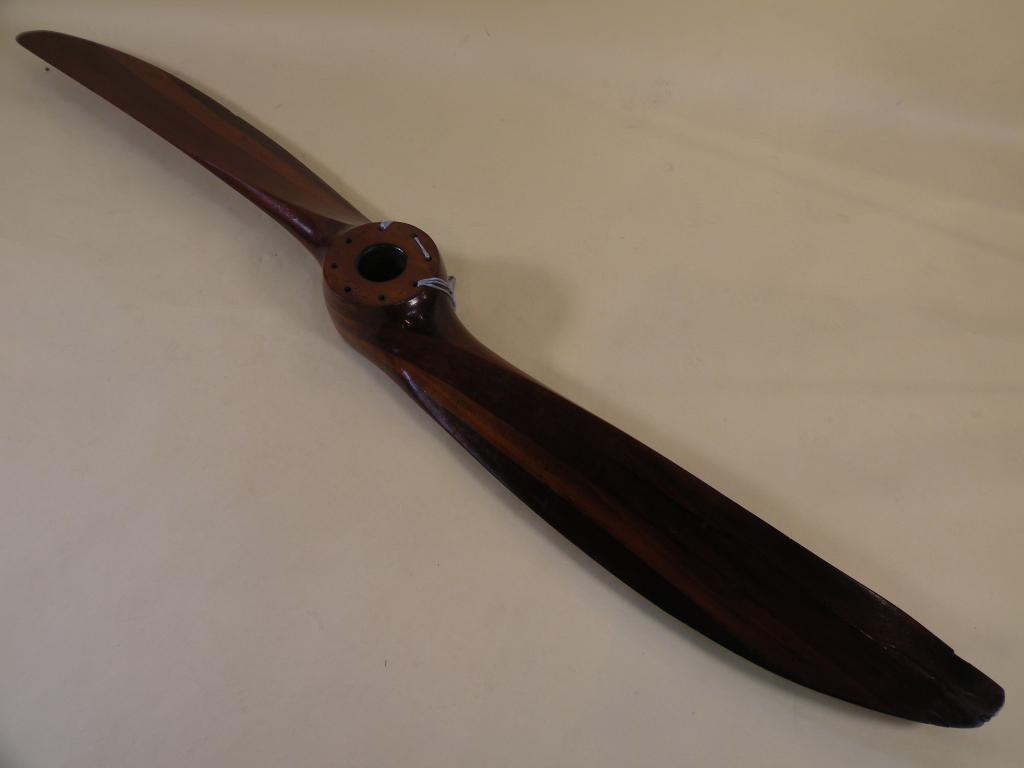 Appraisal: A mahogany aircraft propeller stamped to centre Wolseley Viper amd