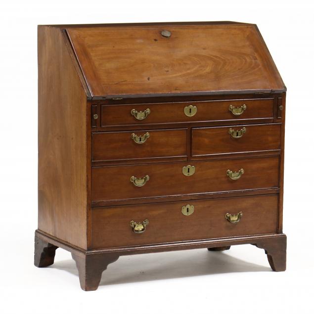 Appraisal: GEORGE III MAHOGANY SLANT FRONT DESK Circa oak secondary dovetailed