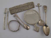 Appraisal: Silver and white metal Three silver spoons a small mirror