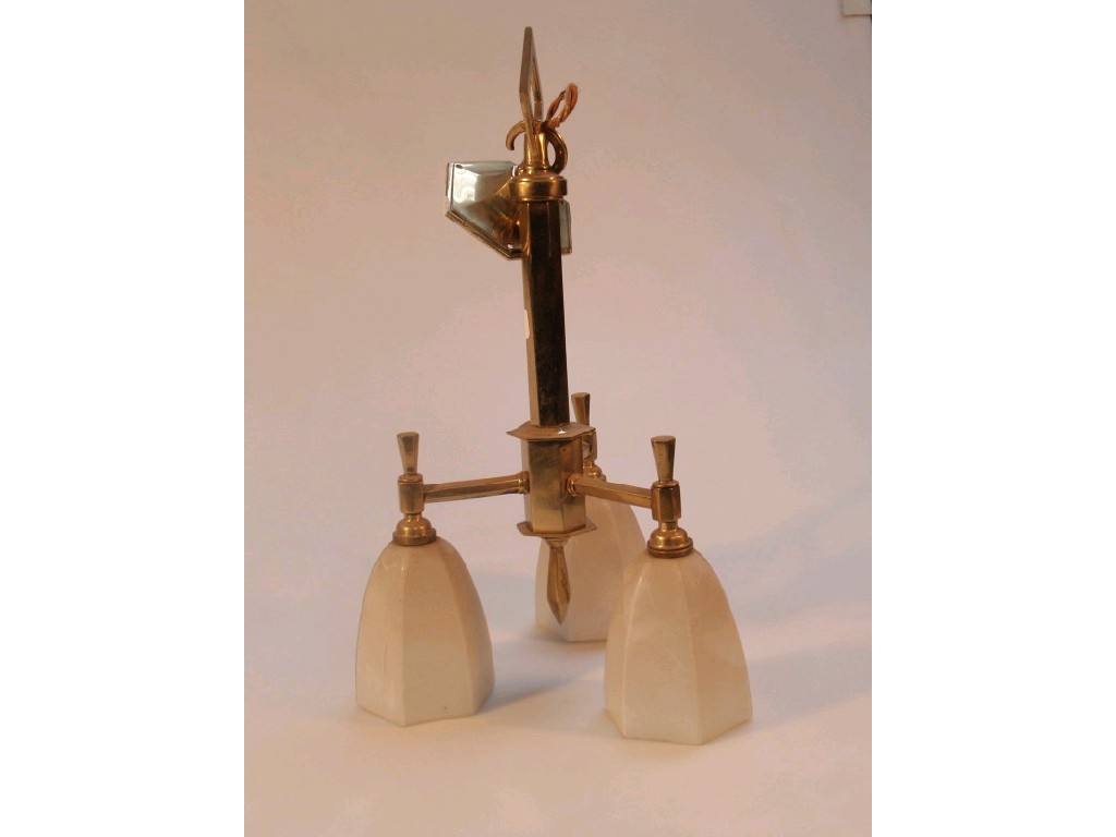 Appraisal: A gilt metal three light ceiling light fitting with milk