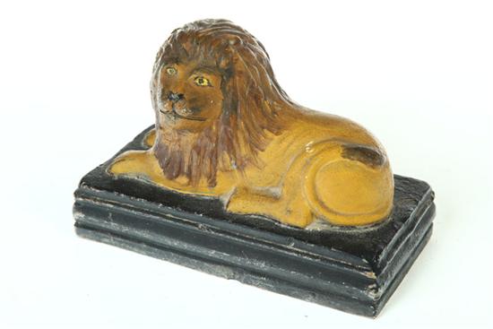 Appraisal: FOLK ART POTTERY LION American late th-early th century Buff