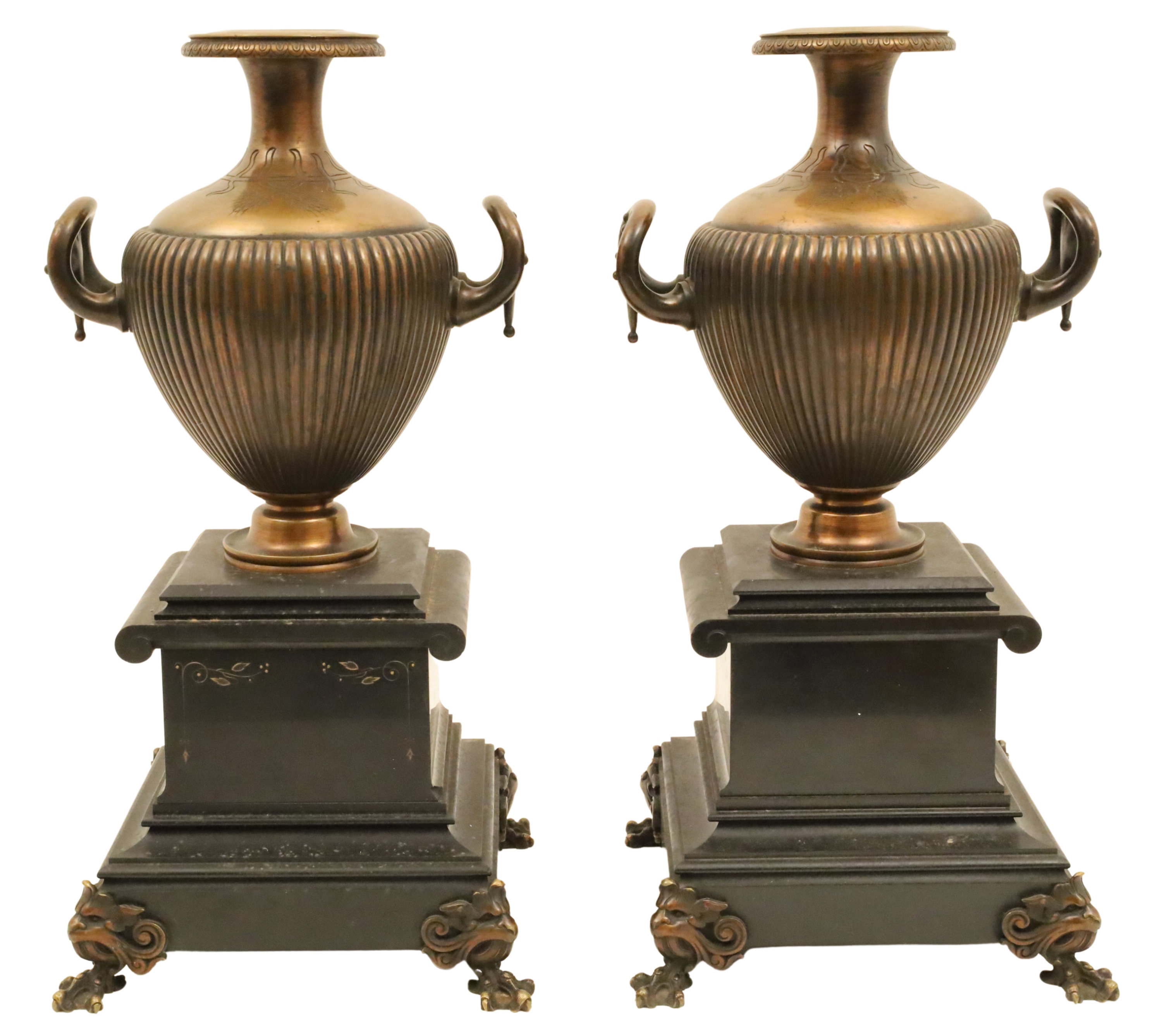 Appraisal: PR OF GREEK BRONZE URNS ON BLACK ONYX PEDESTALS Pair