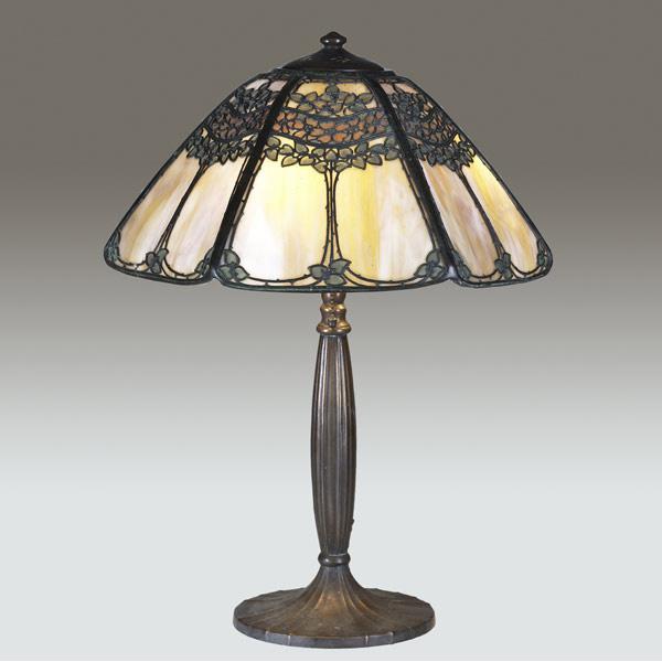 Appraisal: HANDEL Table lamp its faceted leaded glass shade painted and