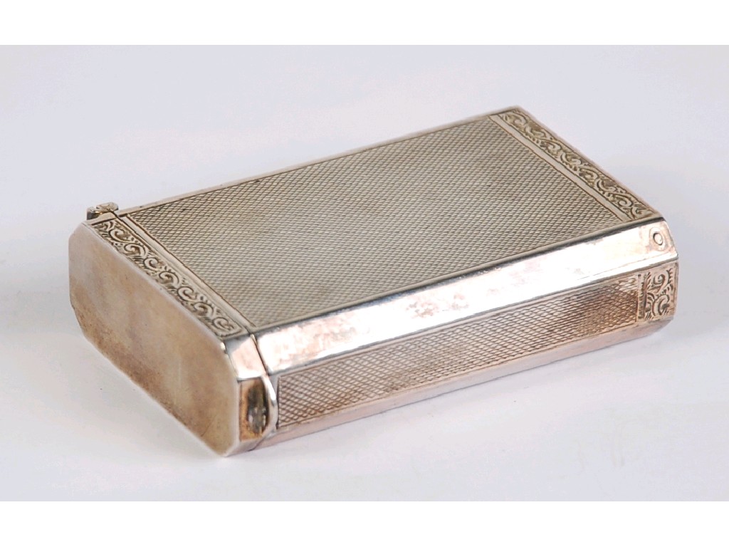 Appraisal: ENGINE TURNED SILVER CIGARETTE PACKET HOLDER oblong with canted corners