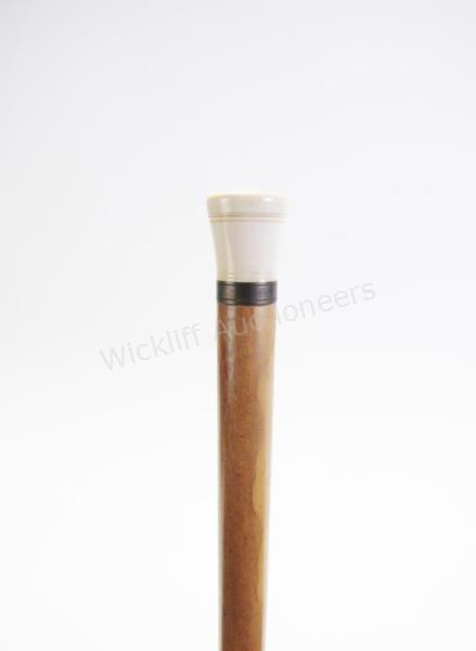 Appraisal: Gambler's Cane beautiful solid wood shaft hand carved handle that