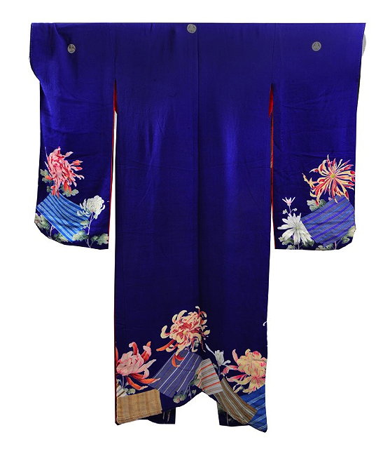 Appraisal: A JAPANESE DARK BLUE GROUND KIMONO with polychrome foliate decoration