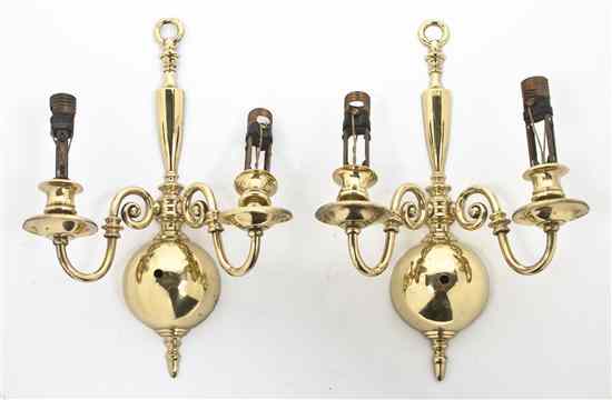 Appraisal: A Pair of Dutch Baroque Style Brass Two-Light Sconces each