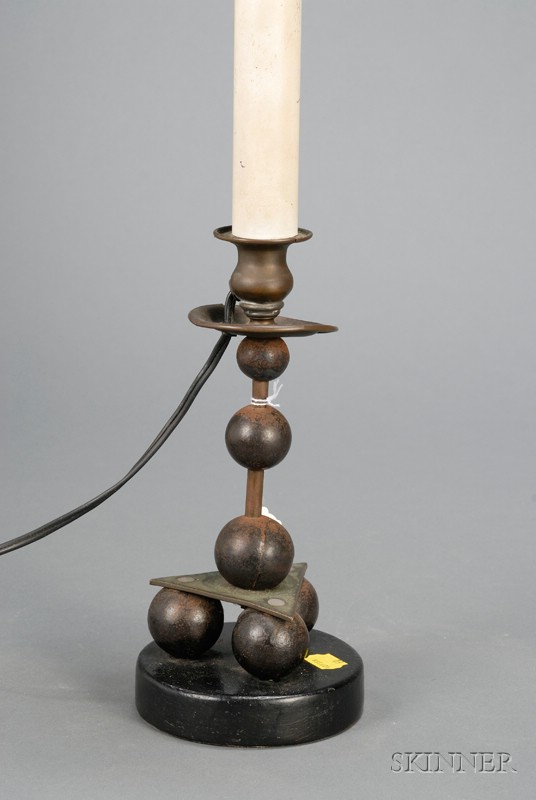 Appraisal: Bronze and Iron Candlestick Continental th century electrified iron balls