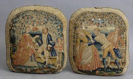 Appraisal: PAIR OF ENGLISH NEEDLEWORK OVAL PANELS MOUNTED AS PILLOWS The